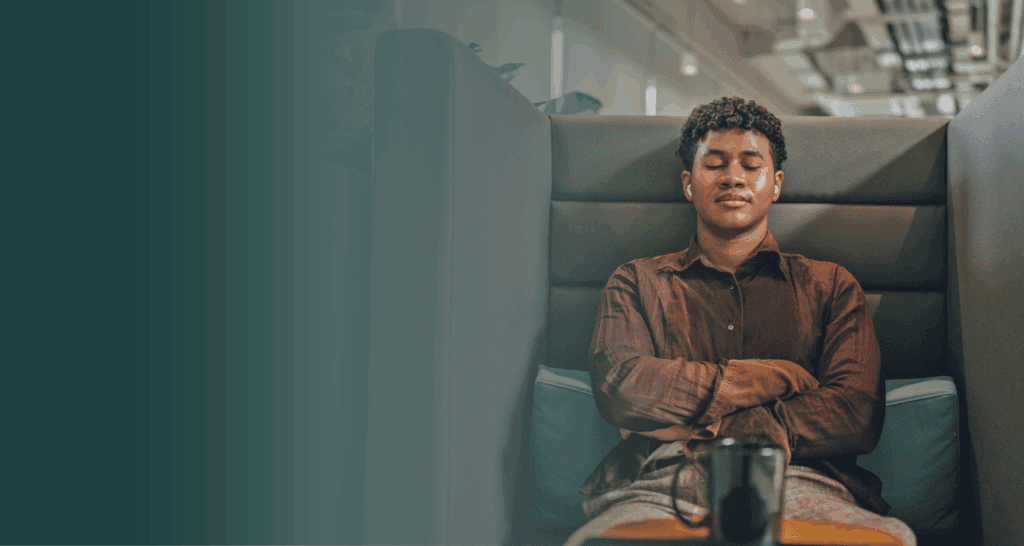 Employee on a lunch break taking a moment to meditate and ground themself